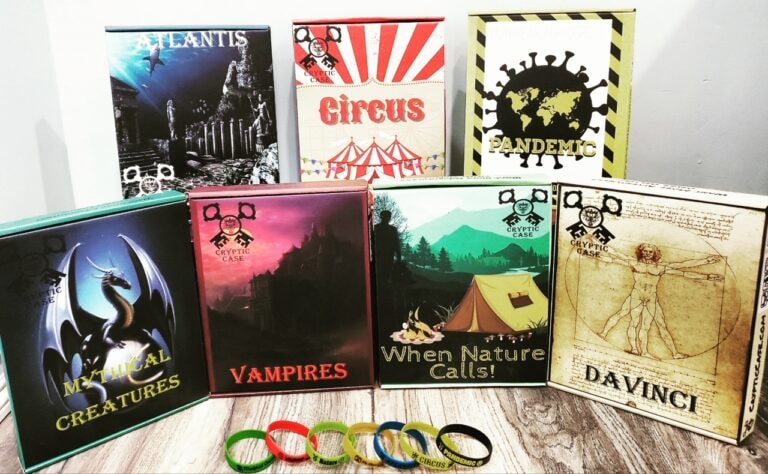 Collection of Cryptic Case escape room boxes display